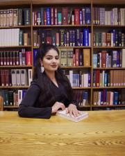 Saiemeh sitting at desk in Buehler Library